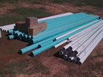 Stacks of 1.25—6 Inch PVC Pipe for a Custom Rainwater Collection System Installation